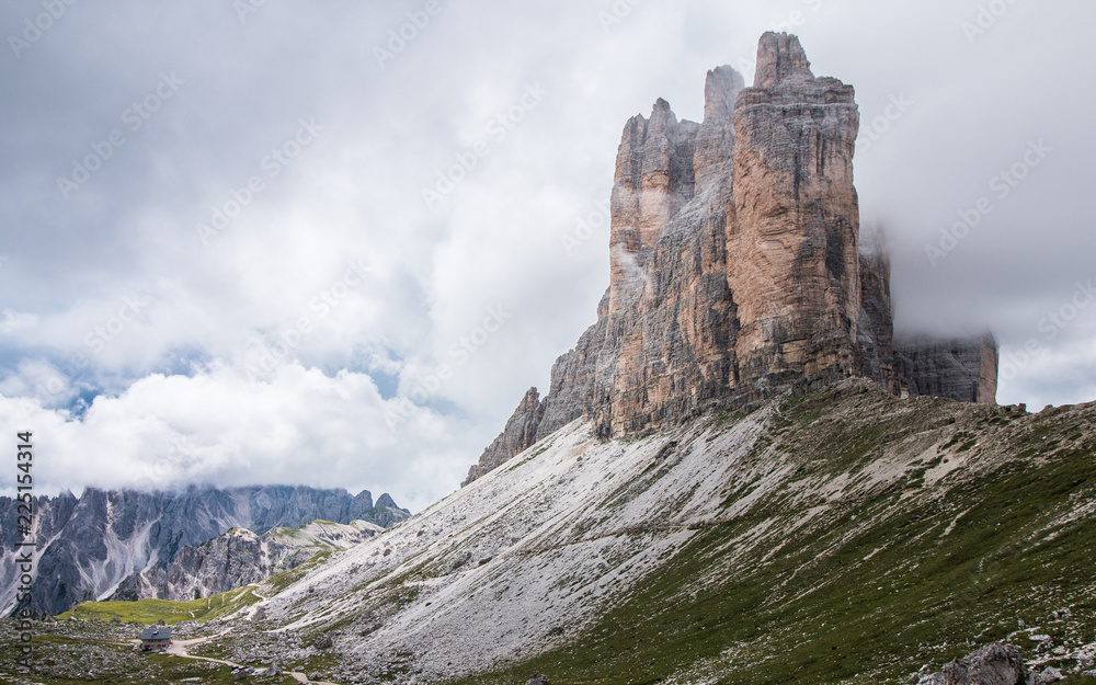 Summer panorama view of Three Peaks - Tre Cime di Lavaredo Massive Rock, Sexten Dolomites, South Tyrol. Dolomite Alps, Italy