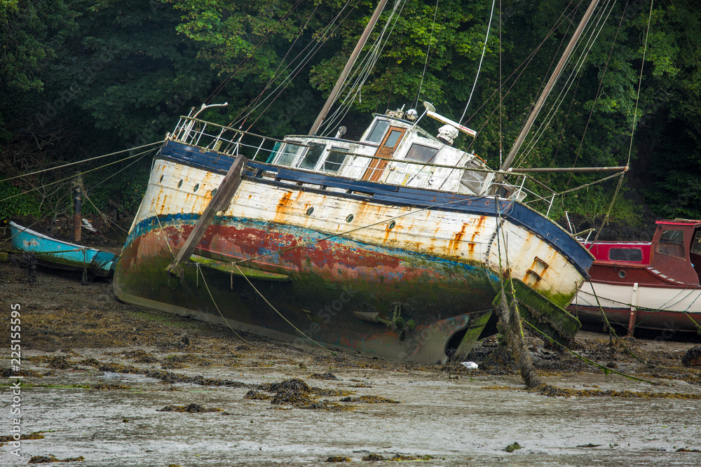 Old Boat at rest on mud Old Boat at rest on mud