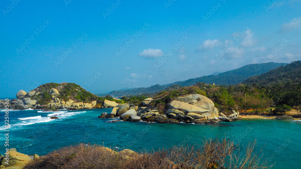 tropical beach with turquoise water at tayrona natural park tropical beach with turquoise water at tayrona natural park