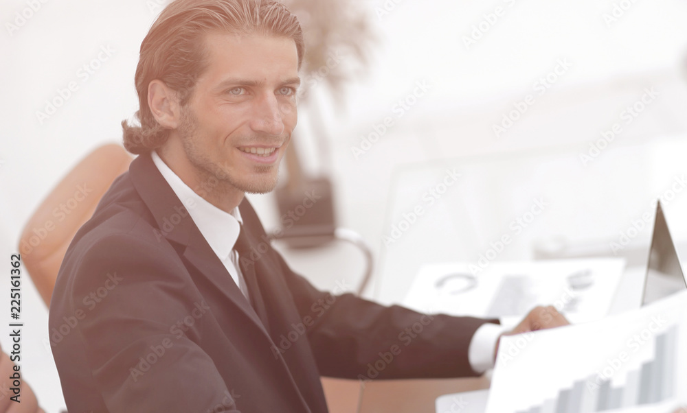 employee gives the Manager the financial report employee gives the Manager the financial report