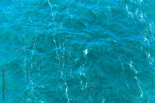 Sea background, water texture - water with small waves, top view