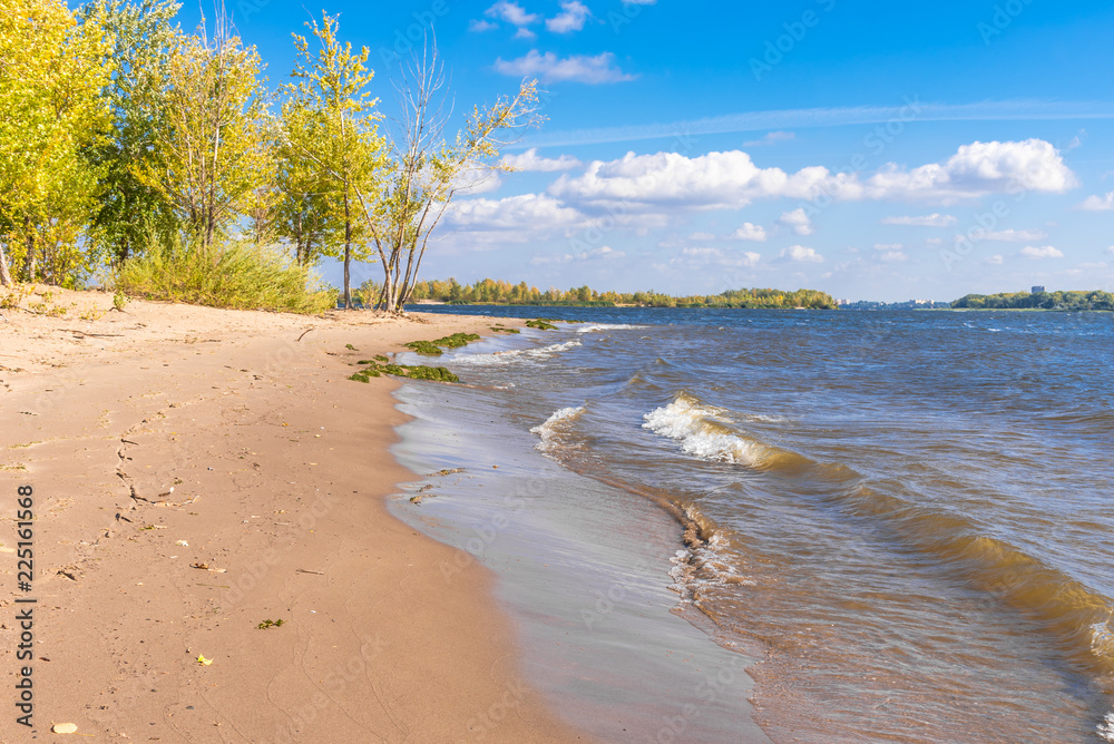 Beautiful seascape - small waves and a deserted beach Beautiful seascape - small waves and a deserted beach