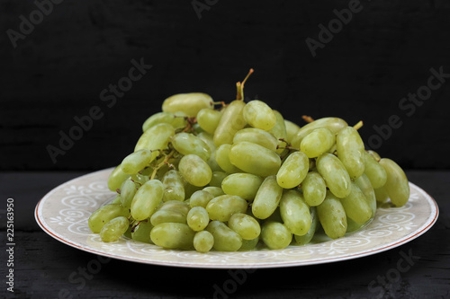 Tasty fresh green grape in a plate