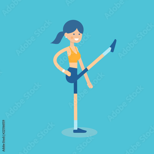 Cute smiling girl in sportswear doing leg swings