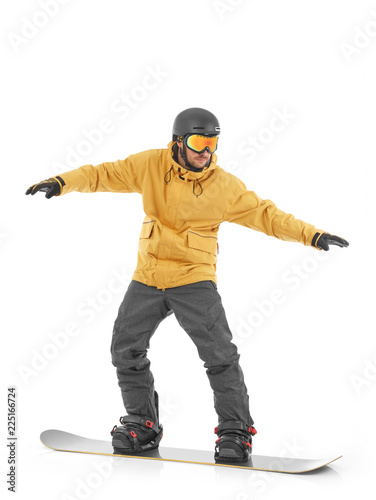 Snowboarder kipping the balance photo