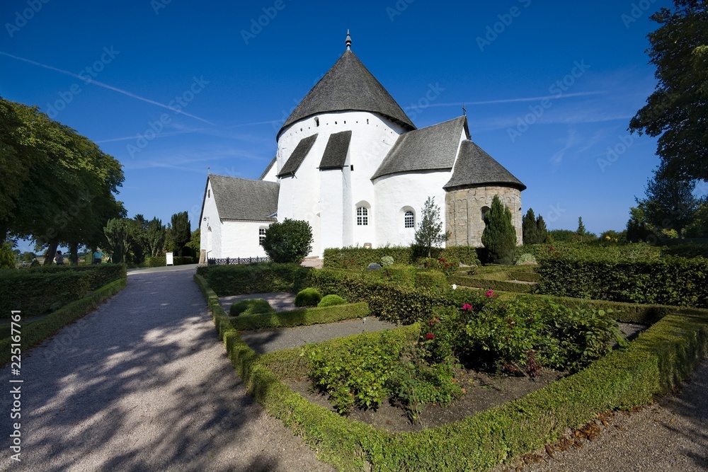Defensive round church in Osterlars, Bornholm, Denmark. It is one of four round churches on the Bornholm island. Built about 1150, regarded the oldest round church