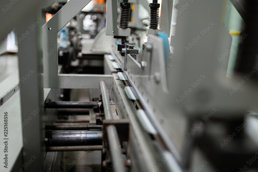 Machinery and printing processes in a modern printing house. Machinery and printing processes in a modern printing house.