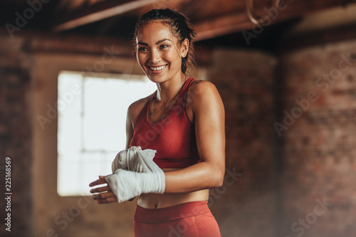 Woman getting ready for boxing practice © Jacob Lund