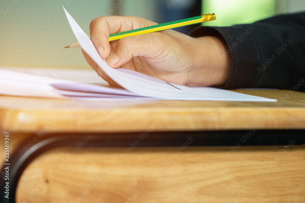 Zdjęcie Stock Student taking exams, writing examination on paper