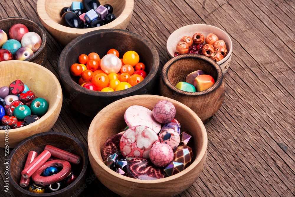 Fashion beads in wooden bowls Fashion beads in wooden bowls