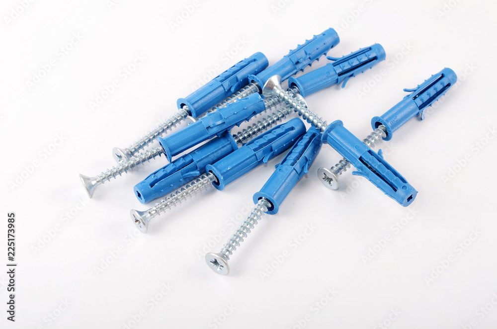 The new silver screws with dowels close-up The new silver screws with dowels close-up