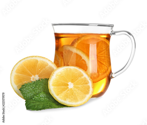 Cup of tea, lemon and mint on white background