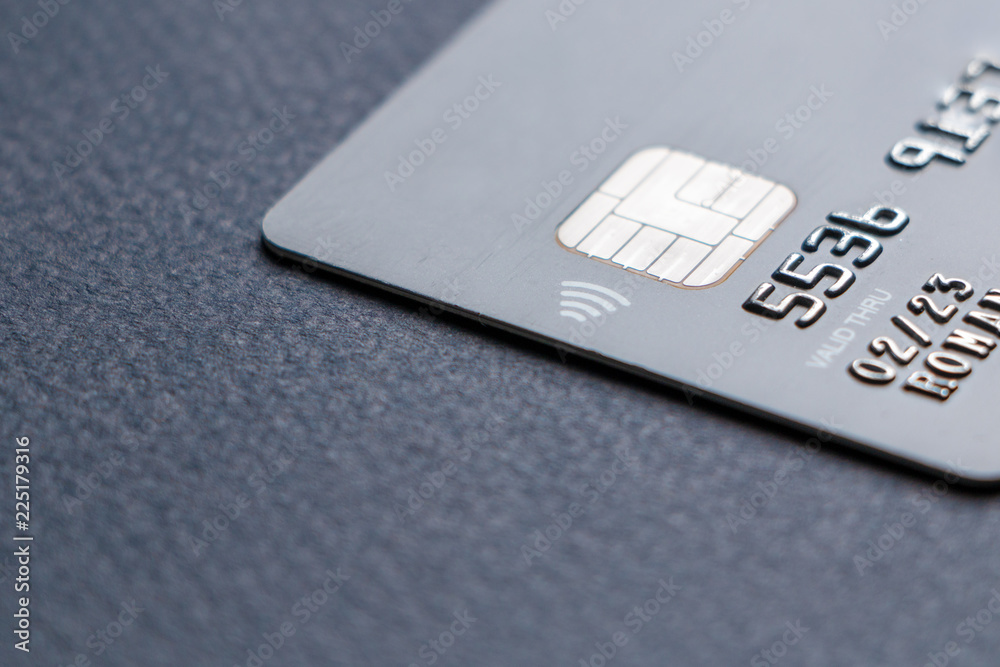 Black credit card with chip and wireless payment Black credit card with chip and wireless payment