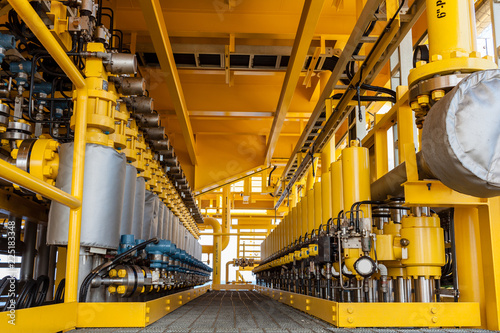 Offshore oil and Gas central processing platform and remote platform produced oil, natural gas and liquid condensate for set to onshore refinery from offshore in ocean sea background.