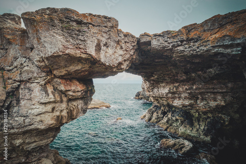The rock formation Arch in the sea near Tyulenovo, Bulgaria, Europe .