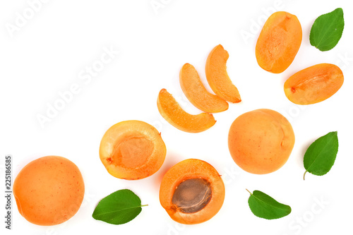 Apricot fruits with leaves isolated on white background with copy space for your text. Top view. Flat lay pattern