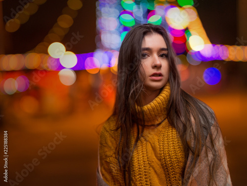 Young girl in a night city