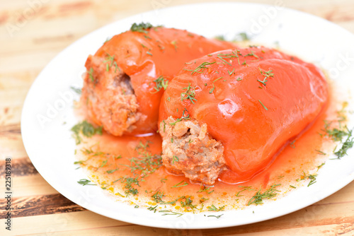 Stuffed pepper with meat, rice and carrots. Healthy food. Restaurant dish.