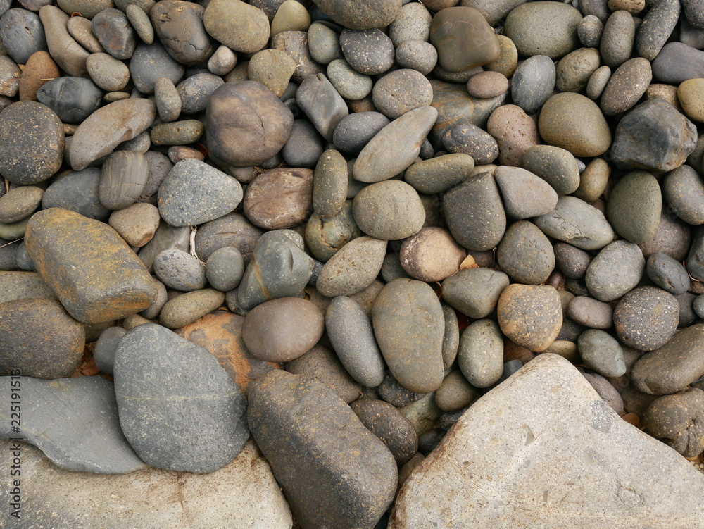 pebbles on the beach,rock stone texture pebbles on the beach,rock stone texture
