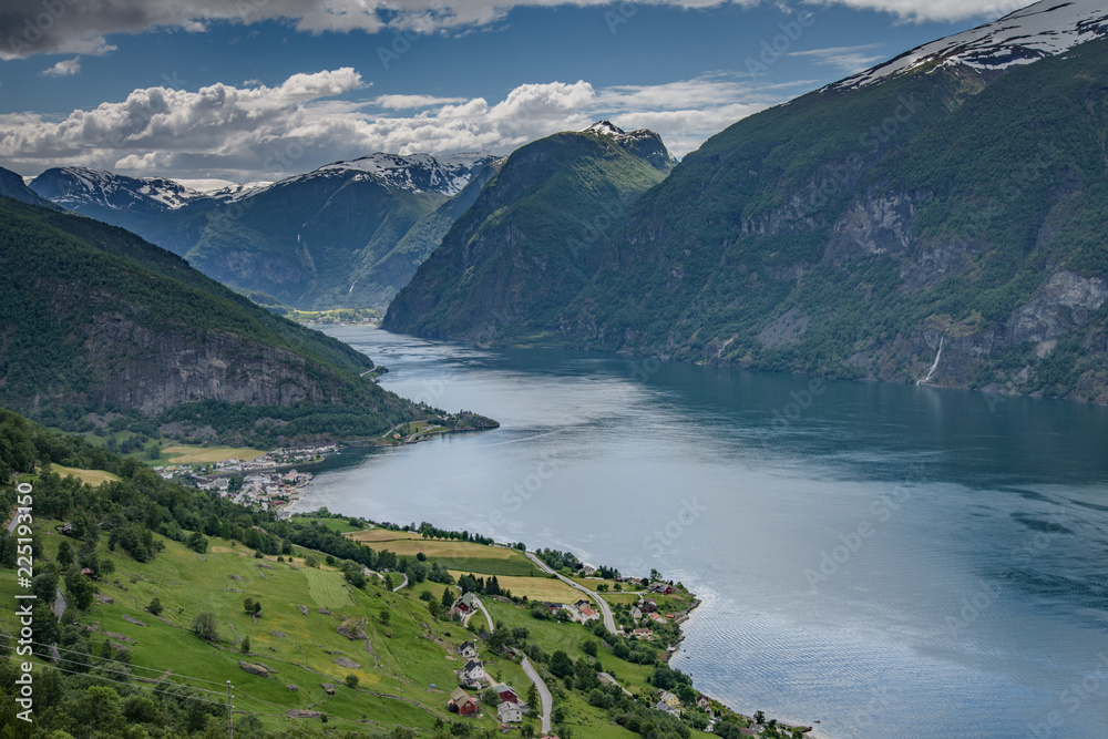 Amazing nature view with fjord and mountains. Beautiful reflection. Location: Scandinavian Mountains, Norway. Artistic picture. Beauty world. The feeling of complete freedom