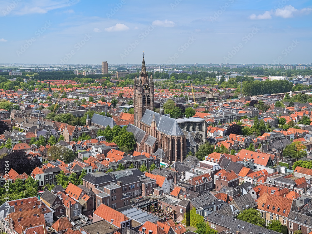 Delft, Netherlands. High angle view on Oude Kerk (Old Church) from the tower of Nieuwe Kerk (New Church).