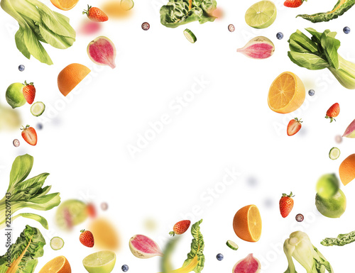 Fototapeta Naklejka Na Ścianę i Meble -  Flying fruits and vegetables ingredients on white background .  Healthy food concept
