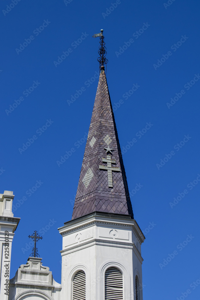 Closeup of the Cross and Star Icon on One of the Spires of the Saint Louis Cathedral in the French Quarter of New Orleans, Louisiana, USA