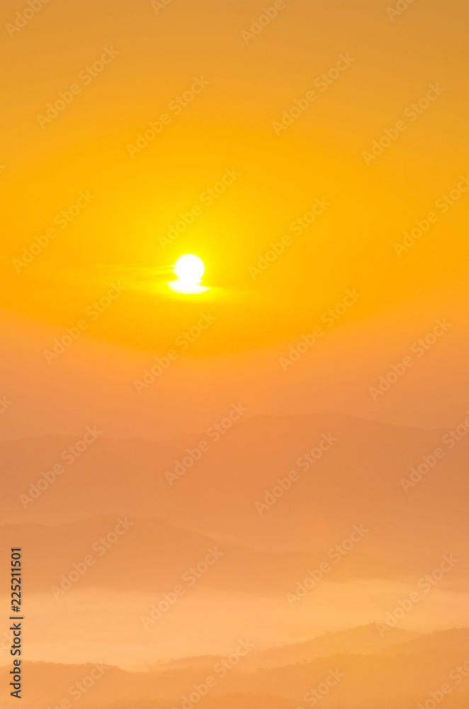 Obraz premium Sunrise over mountain,covered with fog , soft focus.