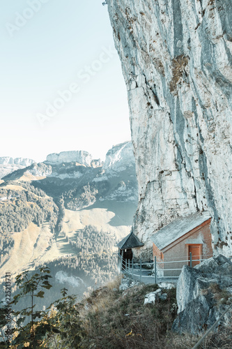 wooden mountain hut and hiking trail at the ebenalp rocks of Appenzell alps, Switzerland