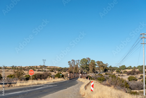 Single lane road bridge over the Riet River near Koffiefontein photo