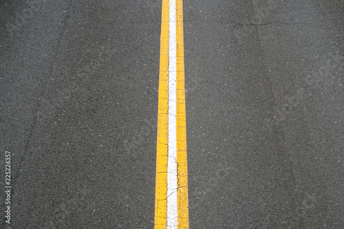 white line on asphalt road - two lane street -