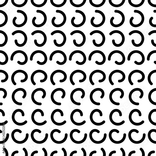 Abstract seamless pattern with black spirals