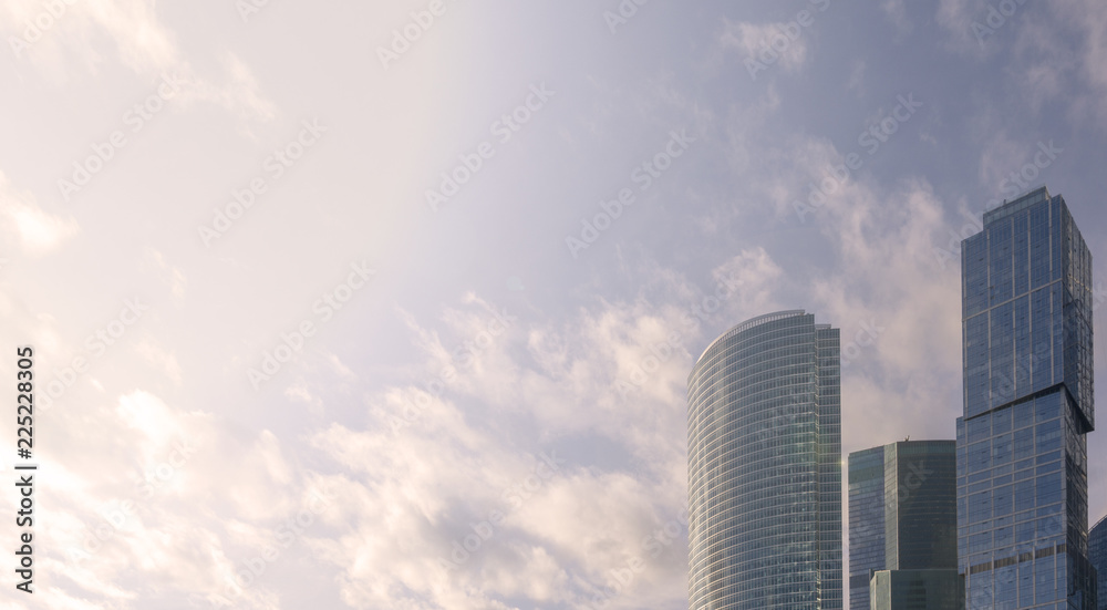 Skyscrapers in the rays of sunset. Skyscrapers in the rays of sunset.