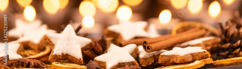cinnamon stars with oranges for christmas panorama