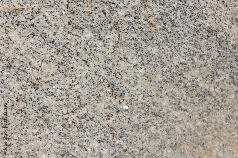 Granite background. Texture of gray granite stone. Natural pattern in gray tones. Abstract background Granite background. Texture of gray granite stone. Natural pattern in gray tones. Abstract background