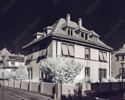 Old renovated house in calm quarter of Strasbourg, infrared view photo