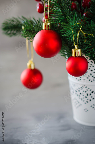 Christmas background with xmas fir branches and decorations. Christmas greeting postcard.
