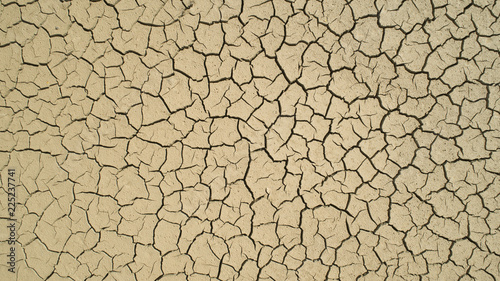 Aerial view of Dry cracked earth. Climate change and drought land. Global warming. 