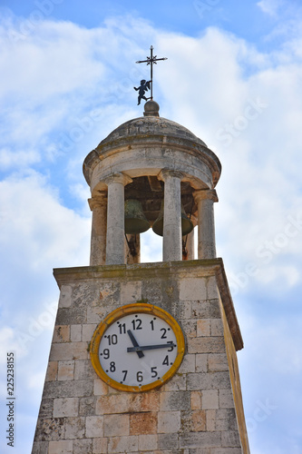 Italy, Casamassima, tower with clock and bell. photo