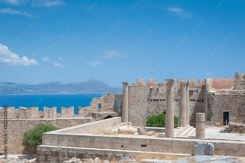 Obraz premium Lindos Acropolis. Ancient clifftop ruins. Remains of a Doric Temple of Athena Lindia, dating from about 300 BC. Greek Island of Rhodes, Rodos.
