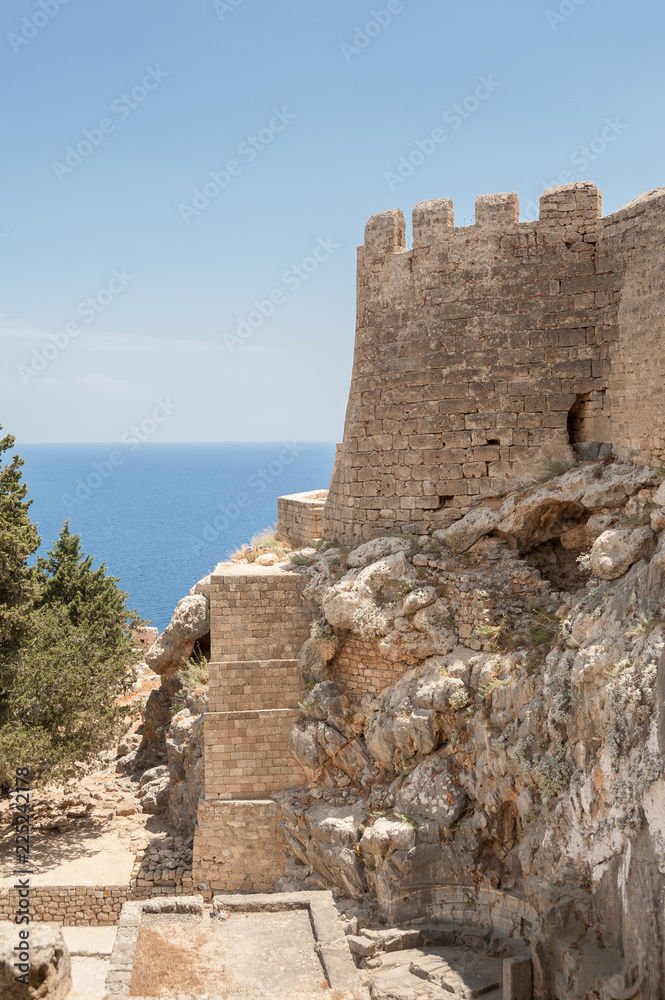 Remains of the Castle of the Knights of St John, built before 13 century. Castle built in the same place as Doric Temple of Athena Lindia, dating from about 300 BC. Greek Island of Rhodes, Rodos.