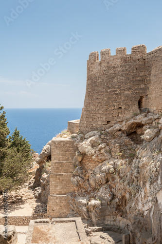 Remains of the Castle of the Knights of St John, built before 13 century. Castle built in the same place as Doric Temple of Athena Lindia, dating from about 300 BC. Greek Island of Rhodes, Rodos.