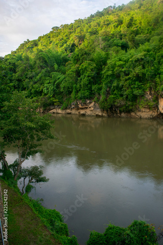 mountain slope on jungle river 