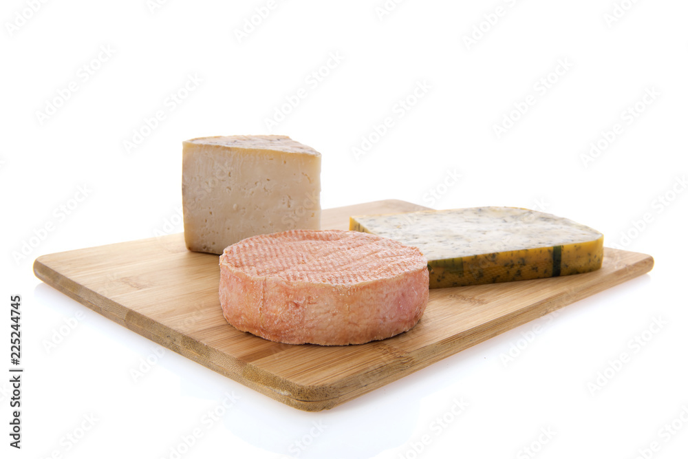 Cheese as snack on cutting board
