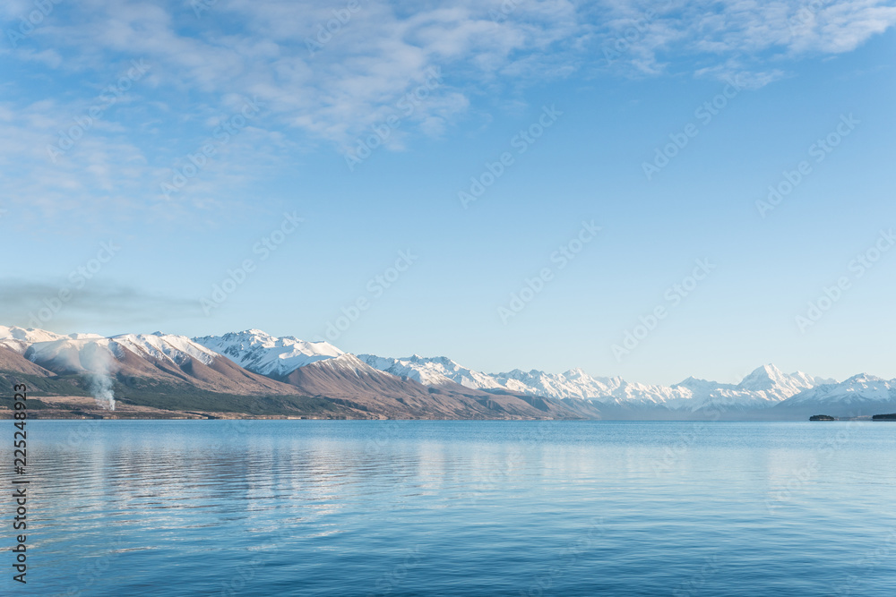 Fire burning with Mount Cook at Lake Pukaki in view Fire burning with Mount Cook at Lake Pukaki in view