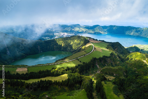 Boca do Inferno viewpoint, Lagoa Verde and Lagoa Azul - lakes in Sete Cidades volcanic craters on San Miguel island, Azores, Portugal. photo