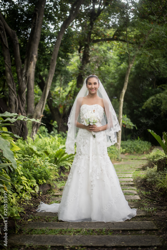 Beautiful Bride with wedding bridal bouquet.