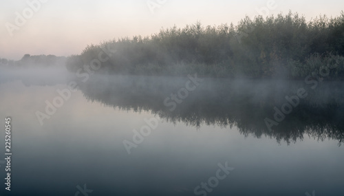 Fototapeta Naklejka Na Ścianę i Meble -  an misty morning at the water