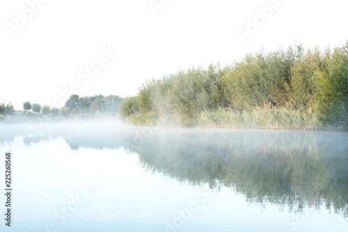 an misty morning at the water