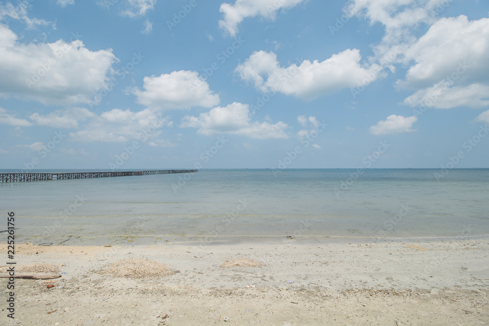 Clear Sea Water, White Sand, Cloudy Sky and Tropical Beach